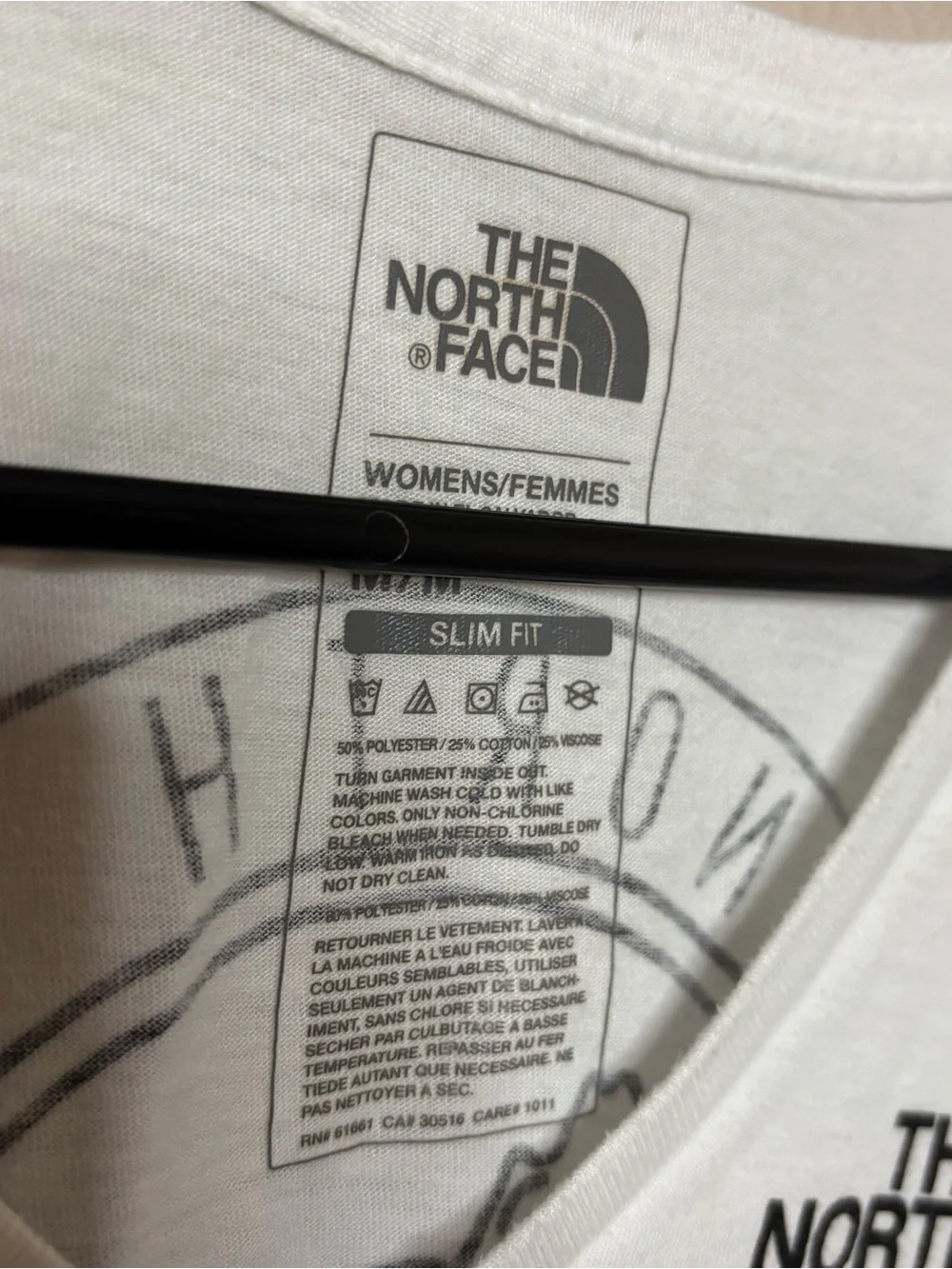 The North Face Women's White V-Neck Logo Tee with Small Chest Emblem - Picture 2 of 3
